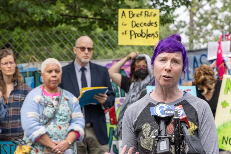 Stefanie Kroll, co-founder of Enviro Philly and a doctorate in ecology, spoke about the damaging effects removing a wetland from FDR Park would have to the environment at a press conference of activist groups on May 6, 2024. (Kimberly Paynter/WHYY)