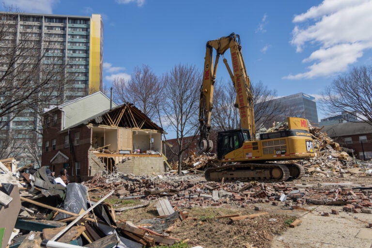 Demolition of the UC Townhomes in March of 2024. (Kimberly Paynter/WHYY)