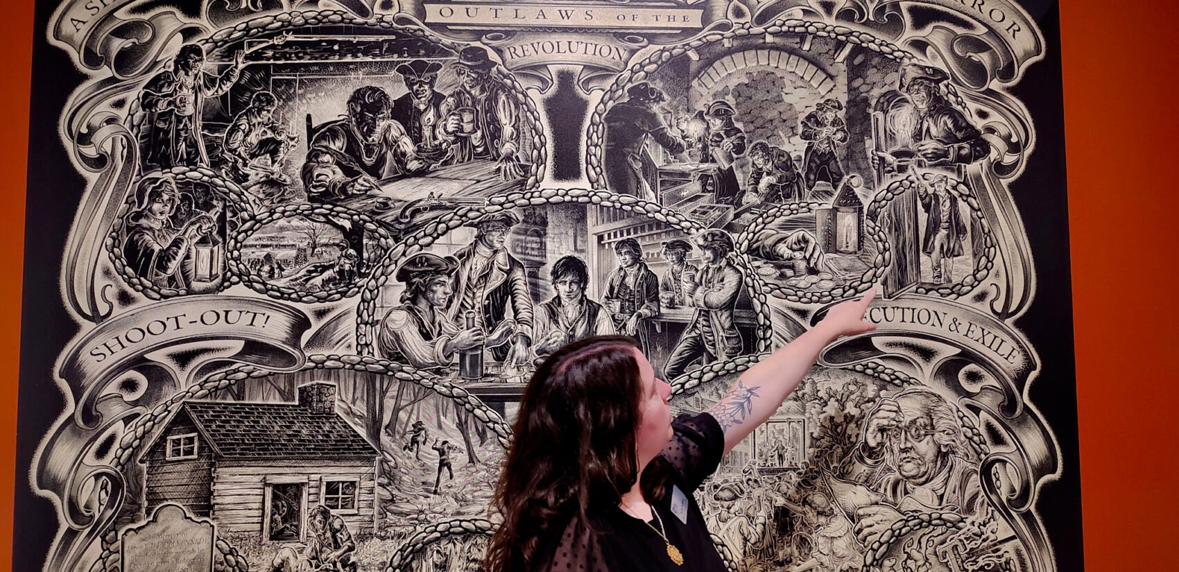 Annie Halliday points to a piece at the Mercer Museum