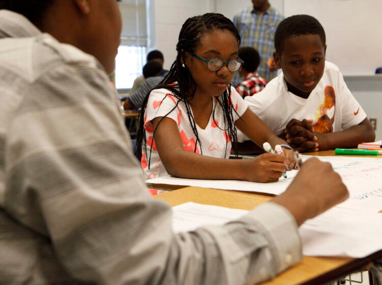 Shina Smith, 13, left, and Chris Douglass, 13, are two of 50 incoming students participating in Westlake High School's 