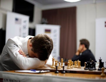 Magnus Carlsen, of Norway, rests during his match against Maxime Vachier-Lagrave, of France, in the sixth round of the Sinquefield Cup chess tournament Tuesday, Sept. 2, 2014, in St. Louis. (AP Photo/Jeff Roberson)