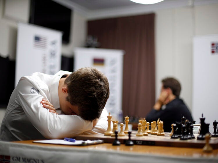 Magnus Carlsen, of Norway, rests during his match against Maxime Vachier-Lagrave, of France, in the sixth round of the Sinquefield Cup chess tournament Tuesday, Sept. 2, 2014, in St. Louis. (AP Photo/Jeff Roberson)