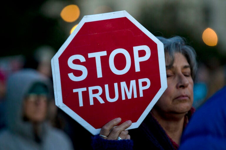 Demonstrators protest outside of the U.S. Capitol