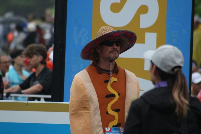 a runner in a hot dog costume