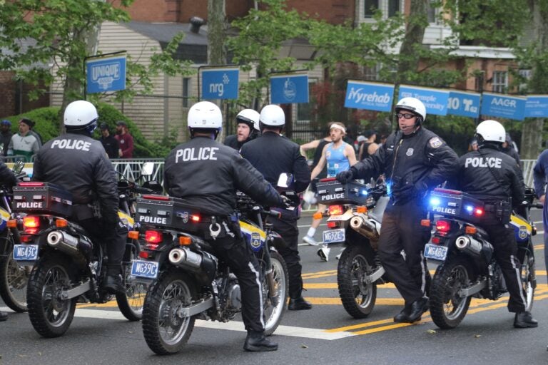 Police monitor the race