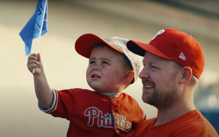 Father and son in Phillies attire