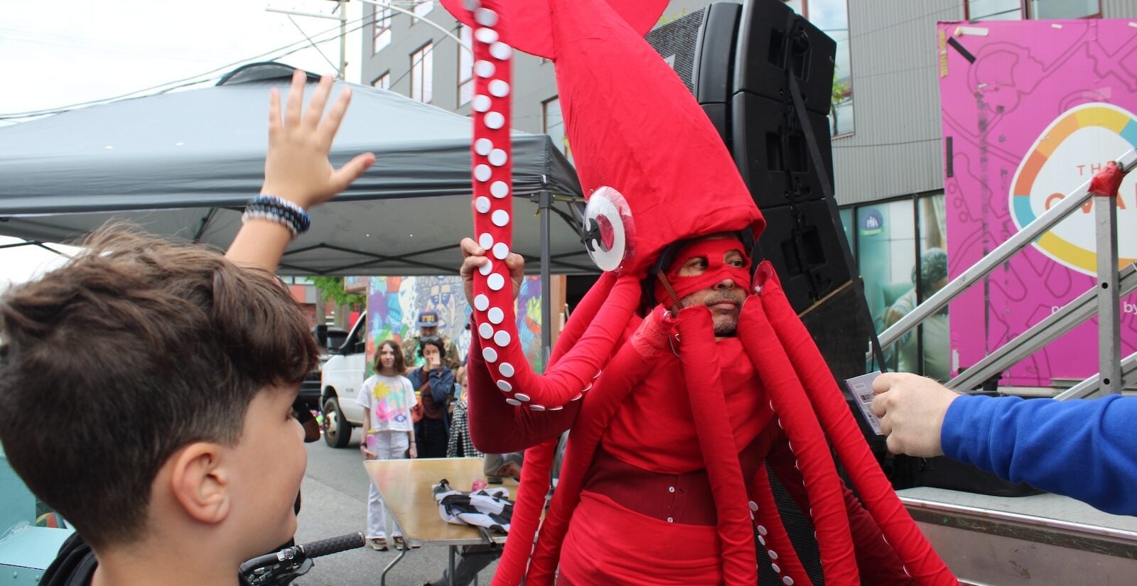Tony Bolante appears in costume as a giant squid at the 2024 Kensington Derby and Arts Festival