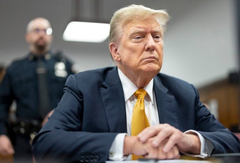 Former President Donald Trump sits in Manhattan criminal court, May 21, 2024, in New York.