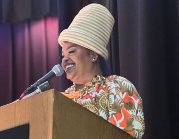 Jill Scott returned to her Alma mater for an unveiling of a mural featuring her, and young scholars from Girls' High, on May 30, 2024. (Amanda Fitzpatrick/WHYY)