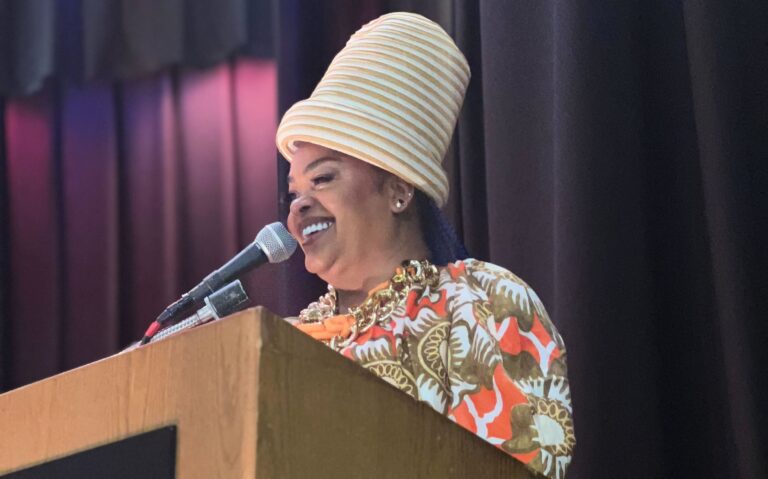 Jill Scott returned to her Alma mater for an unveiling of a mural featuring her, and young scholars from Girls' High, on May 30, 2024. (Amanda Fitzpatrick/WHYY)