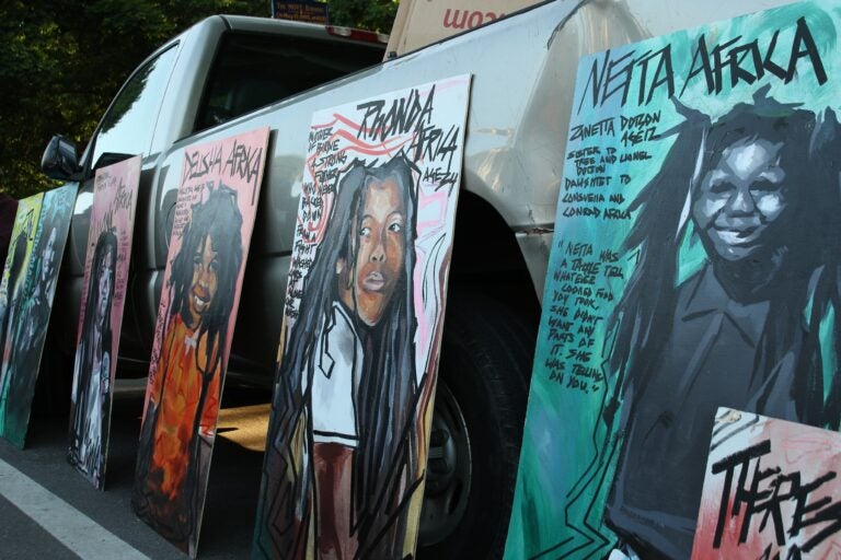 Paintings depicting victims of the MOVE bombing