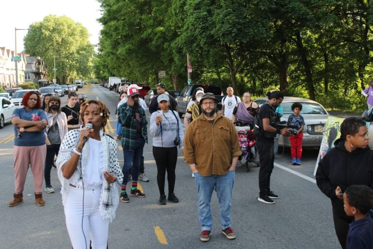 Philadelphians and loved ones of the Africa family gathered in the middle of Cobbs Creek Parkway