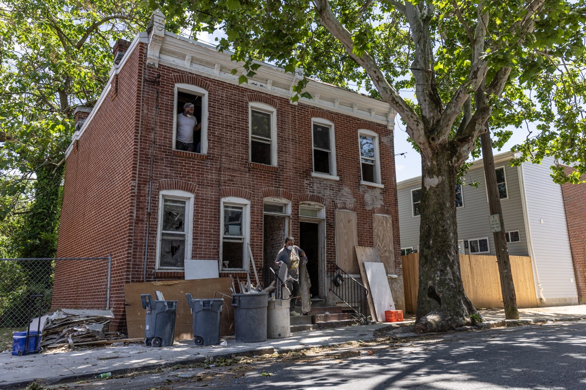 two people work on a property