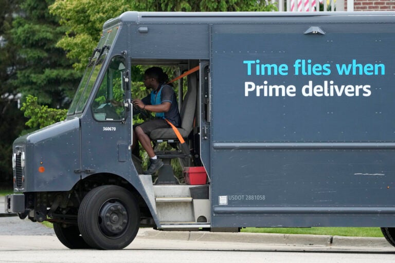 A Amazon truck makes deliveries in Wheeling, Ill., Thursday, May 16, 2024. (AP Photo/Nam Y. Huh)