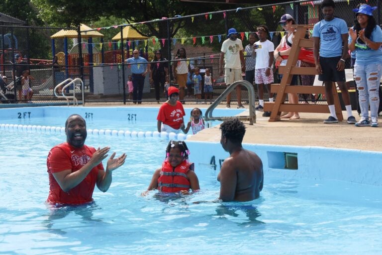 people playing in a swimming pool