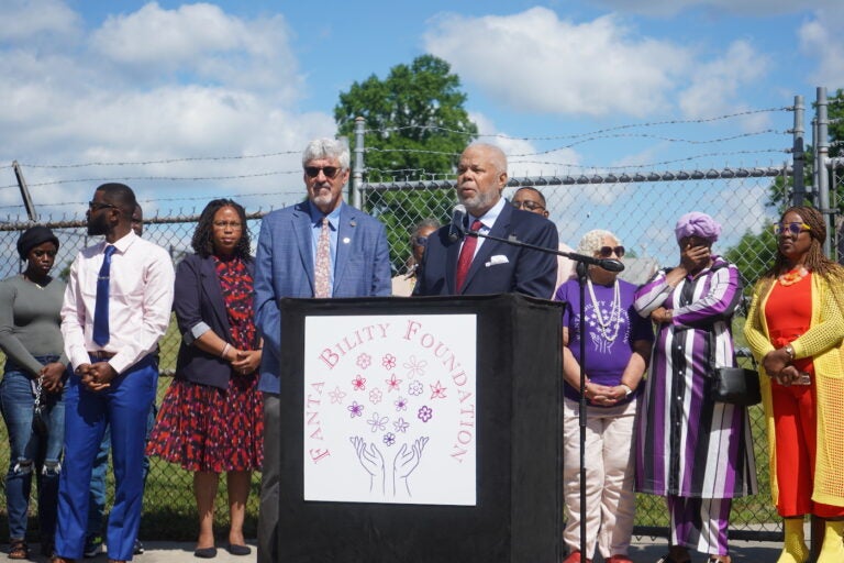 State Sens. Tim Kearney and Anthony H. Williams speaking at a podium