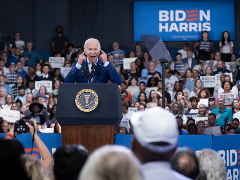 Joe Biden speaking on stage