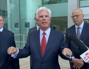 Influential Democratic power broker George Norcross, center, speaks outside the justice complex in Trenton, N.J., Monday, June 17, 2024, about being charged with racketeering and other charges in connection with government issued tax credits.
