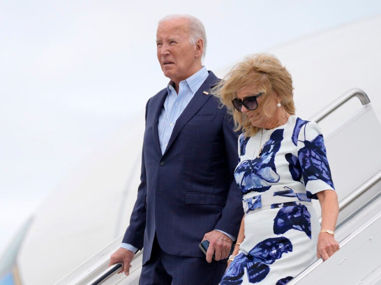 Joe and Jill Biden step off a plame