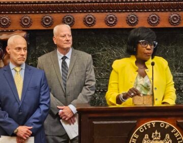 Mayor Cherelle Parker (right), Local 159(b) Eric Desiderio (middle) and Michael Resnik, prisons commissioner, speak at the arbitration announcement June 17, 2024. (Tom MacDonald, WHYY)