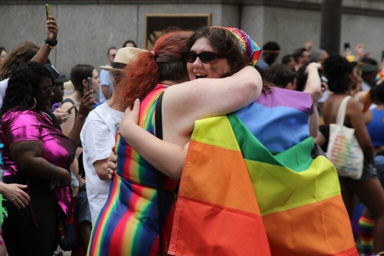 People hugging at Philly Pride
