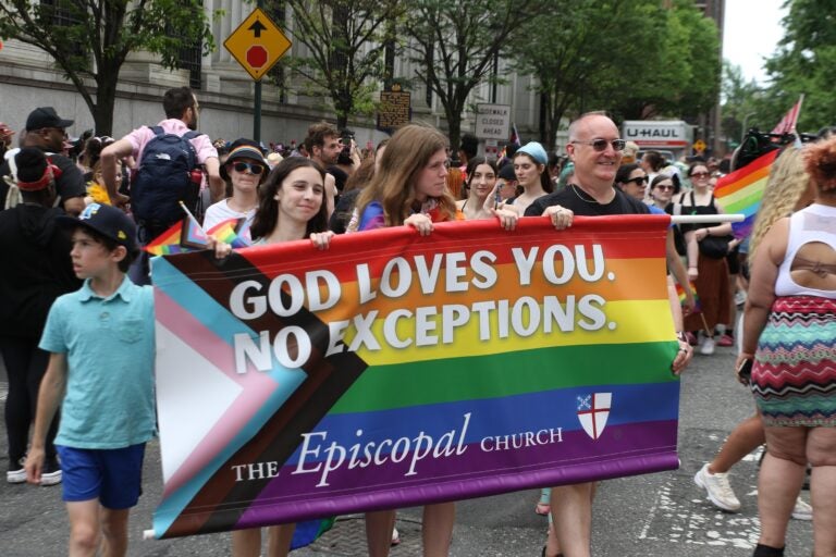 A sign at Philly Pride reads God loves you. No exceptions.