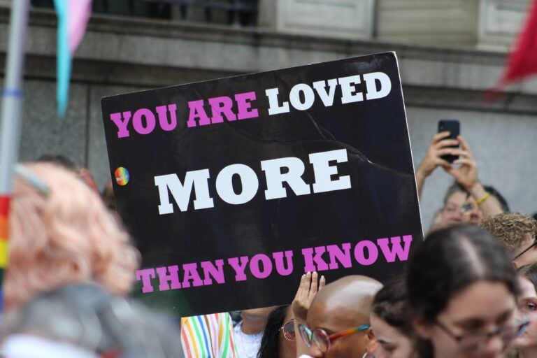 A sign at Philly Pride reads You are loved more than you know