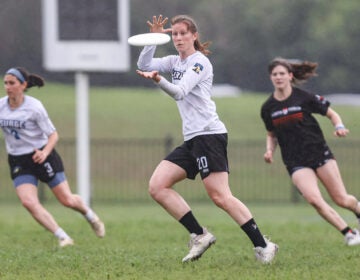 Women playing ultimate frisbee