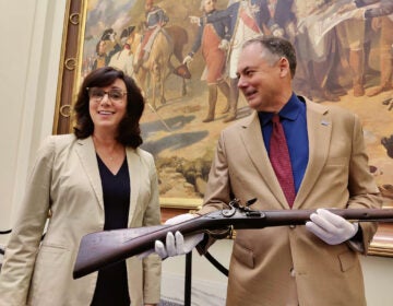 Maria Thackston and Scott Stephenson with the musket