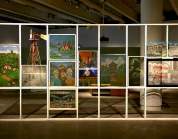 The artists of the Baltimore-based Painted Screen Society created a group of paintiings for the ''Art From the Yard'' exhibit at the Institute of Contemporary Art. The society is dedicated to documenting and preserving the city's tradition of painting mesh screens, which dates back to the early 1900s. (Emma Lee/WHYY)