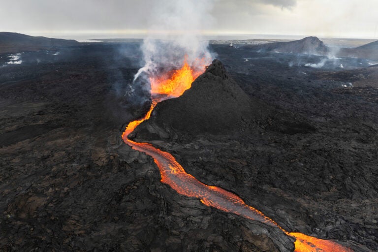 In this photo from June 3, 2024, lava flows from a volcano near Grindavik, Iceland. The area has been a hotbed of volcanic activity since December 2023. (AP Photo/Marco di Marco)