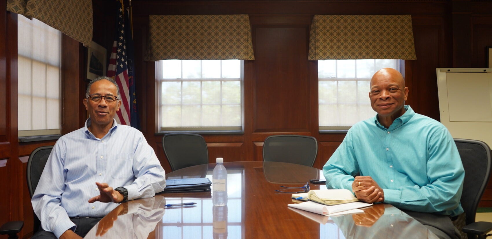 Noël Brandon and Darryl Jenkins sitting at a table