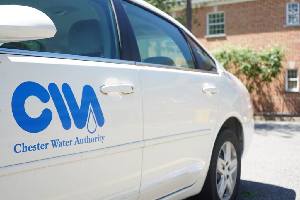 White car with the logo of Chester Water Authority on it