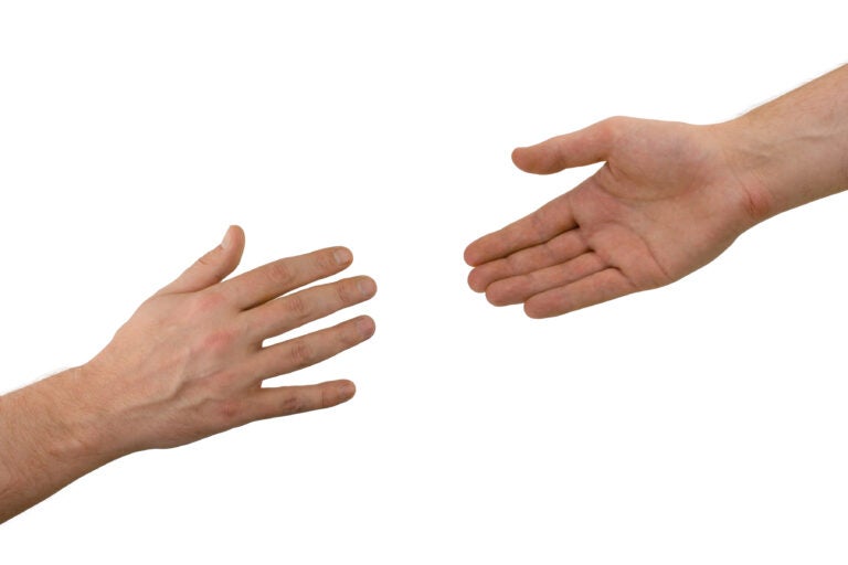 Two hands (help) isolated on white background