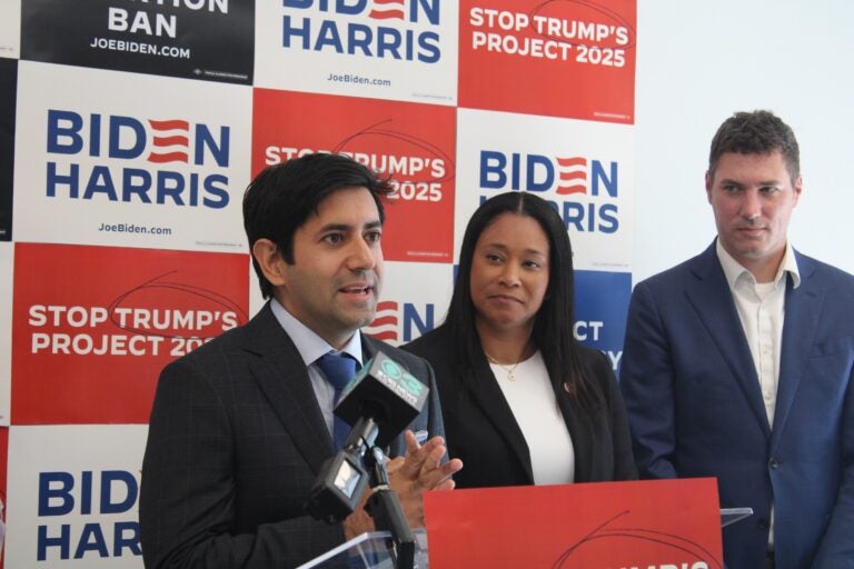 Montgomery County Commissioner Neil Makhija speaks in support of the Biden-Harris campaign as Montco Commissioner Jamila Winder and Chester County Commissioner Josh Maxwell look on