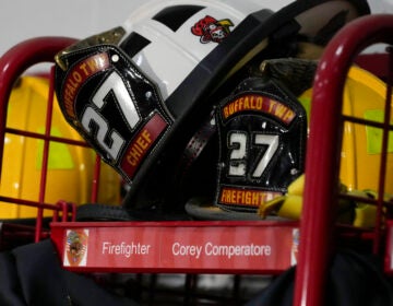 Helmets rest on the locker of firefighter Corey Comperatore at the Buffalo Township Fire Company 27 in Buffalo Township, Pa., Sunday, July 14, 2024. Comperatore was killed during a shooting at a campaign rally for Republican presidential candidate former President Donald Trump in Butler, Pa., on Saturday.