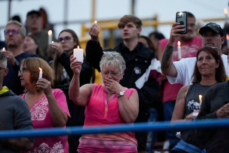 Family, friends and community attend a candlelight vigil for Corey Comperatore, the former fire chief shot and killed at a weekend rally for former President Donald Trump, Wednesday, July 17, 2024, at Lernerville Speedway in Sarver, Pa.
