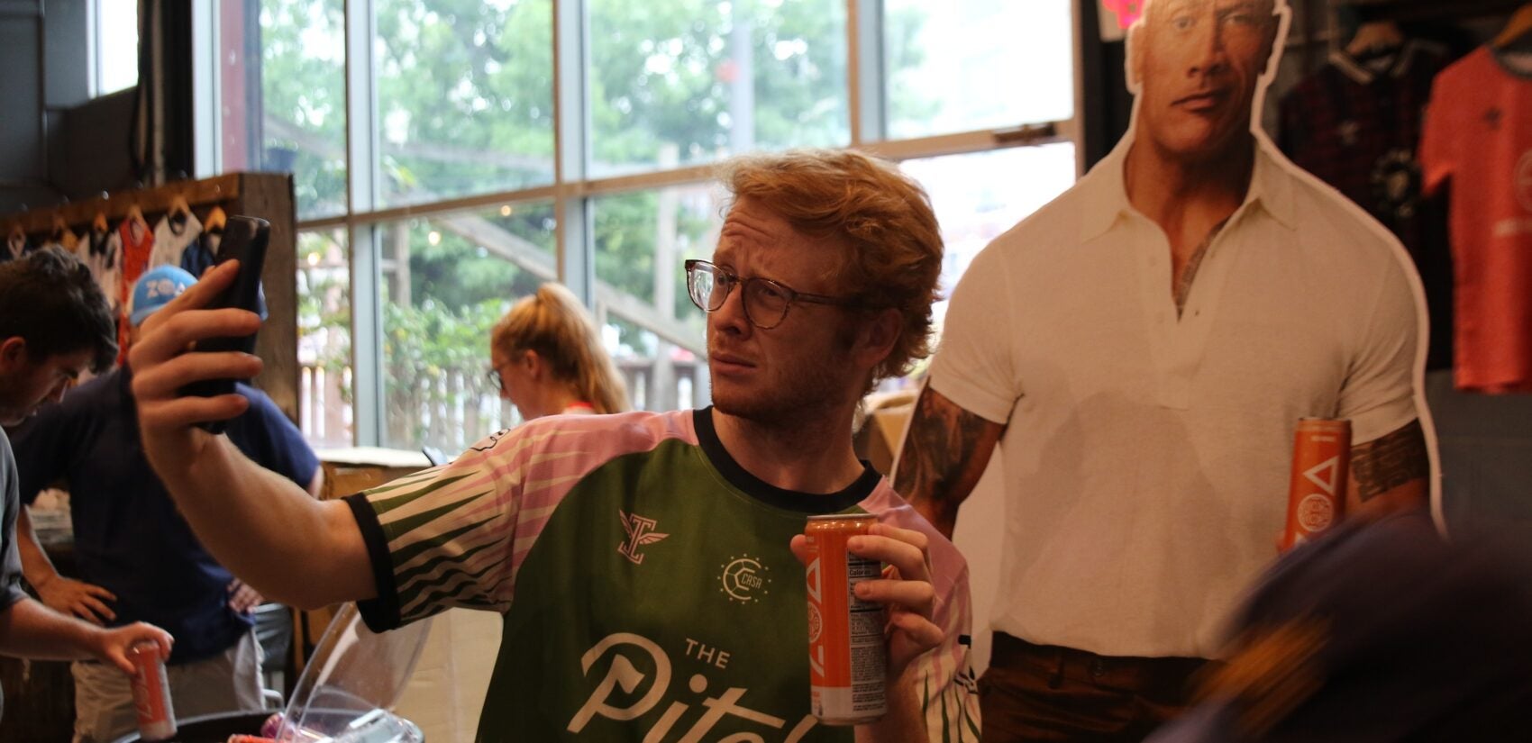 Players picked up their kits and soaked up the vibes during a pre-tournament gathering at Craft Hall on Friday. (Cory Sharber/WHYY)