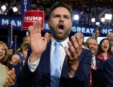 Republican vice presidential candidate Sen. J.D. Vance, R-Ohio, arrives on the floor during the first day of the 2024 Republican National Convention at the Fiserv Forum, Monday, July 15, 2024, in Milwaukee. (AP Photo/Carolyn Kaster)