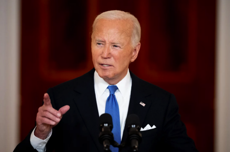 Joe Biden speaking at a podium