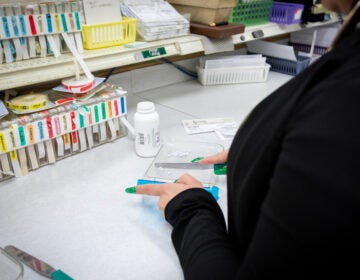 Pharmacist filling a prescription