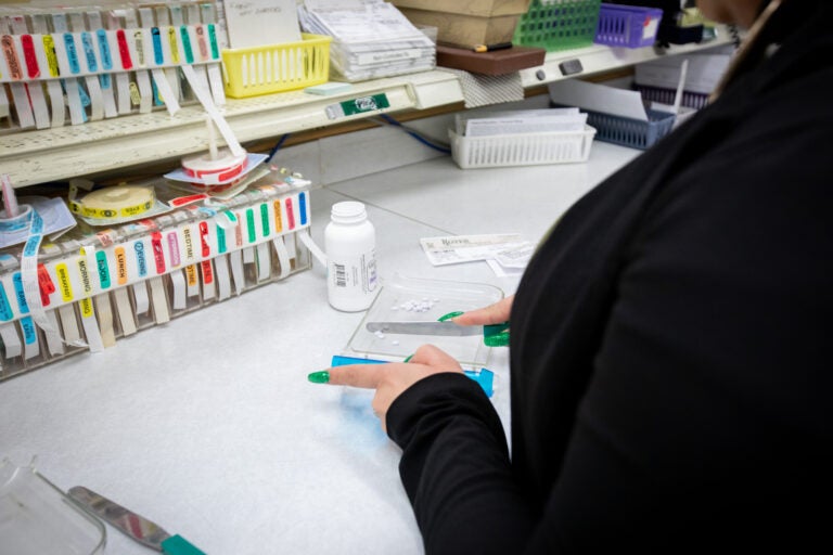 Pharmacist filling a prescription