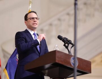 Josh Shapiro speaking at a podium