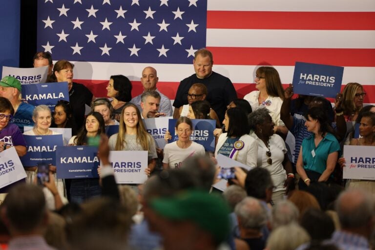 Supporters listen to Gov. Josh Shapiro and Gov. Gretchen Whitmer of Michigan at a campaign event in Montgomery County for Kamala Harris in Ambler, Pa. (Carmen Russell-Sluchansky)