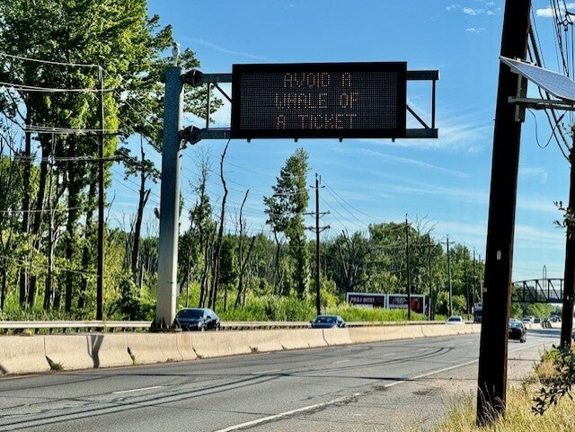 NJ DOT humorous vehicle safety signs