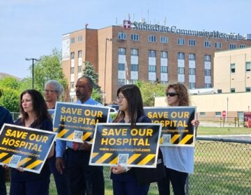 Hospital workers rally in front of Suburban Community Hospital on July 17, 2024, as it transitions to a 