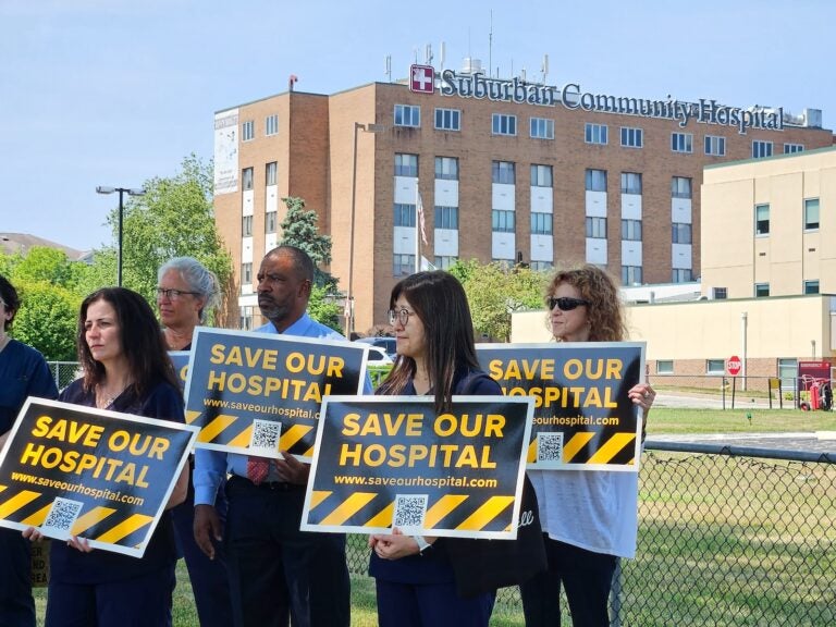 Hospital workers rally in front of Suburban Community Hospital on July 17, 2024, as it transitions to a 