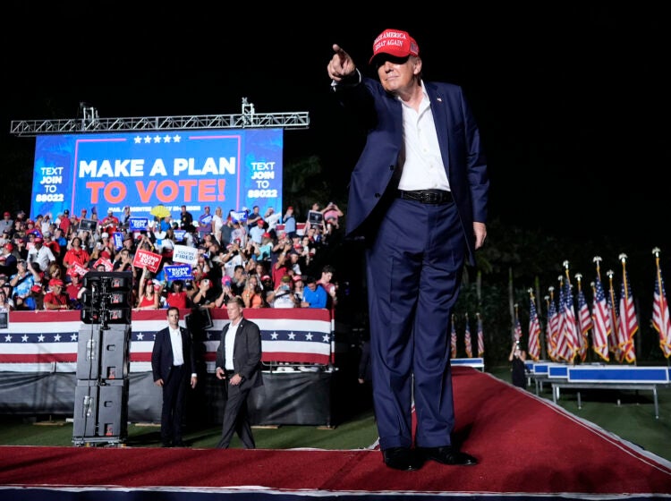 Donald Trump on stage at a rally