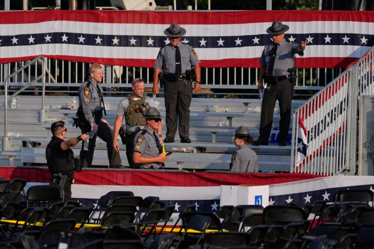 Law enforcement officers gather at the campaign rally site for Republican presidential candidate former President Donald Trump  Saturday, July 13, 2024, in Butler, Pa. Trump's campaign said in a statement that the former president was 