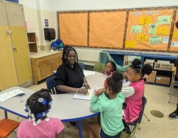 Tsyon Brown is an apprentice teacher in the Freedom Schools Literacy Academy at Mary McLeod Bethune School in North Philadelphia. (Stephen Williams/WHYY)